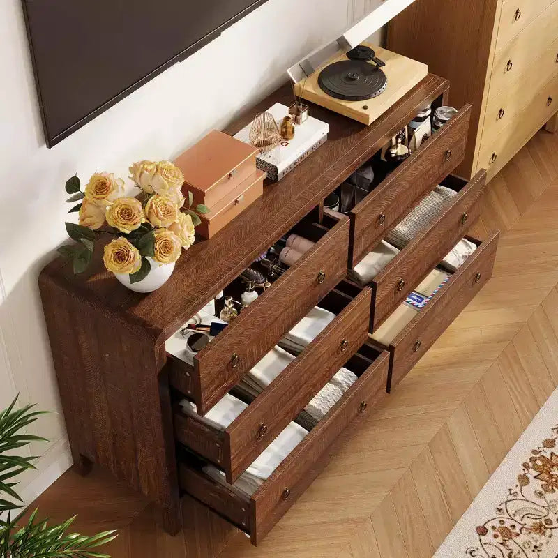 Commode moderne à 7 tiroirs – Aspect bois, poignées métalliques, bords arrondis